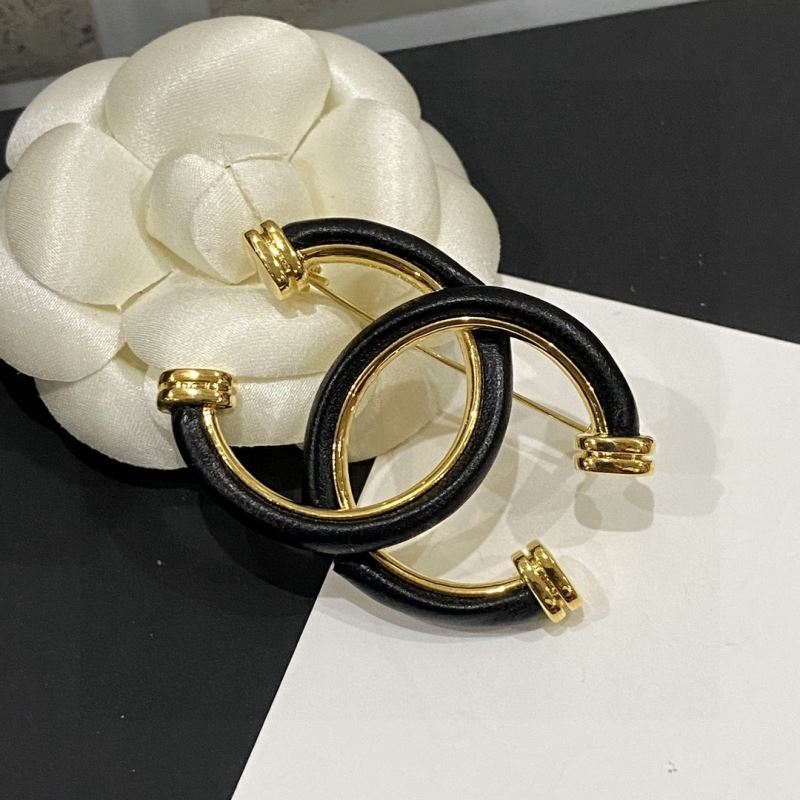 Ch*el brooches